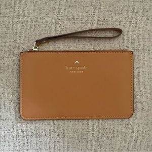 Kate Spade Wristlet, 4.75 x 8 inches, caramel colored